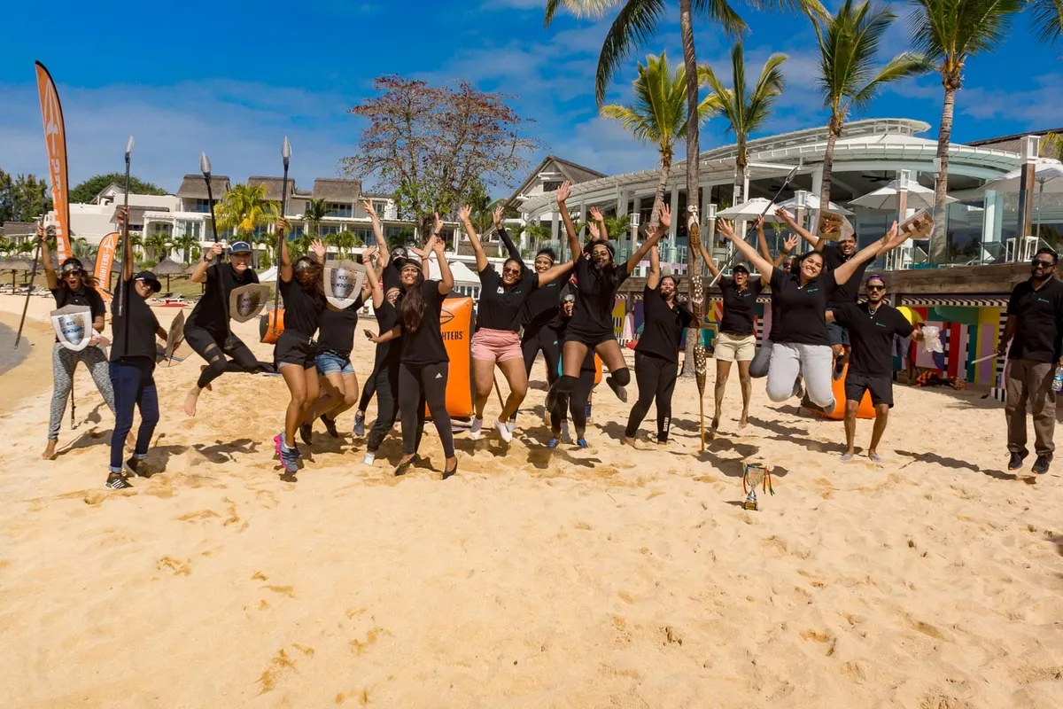 Team jump celebration at resort