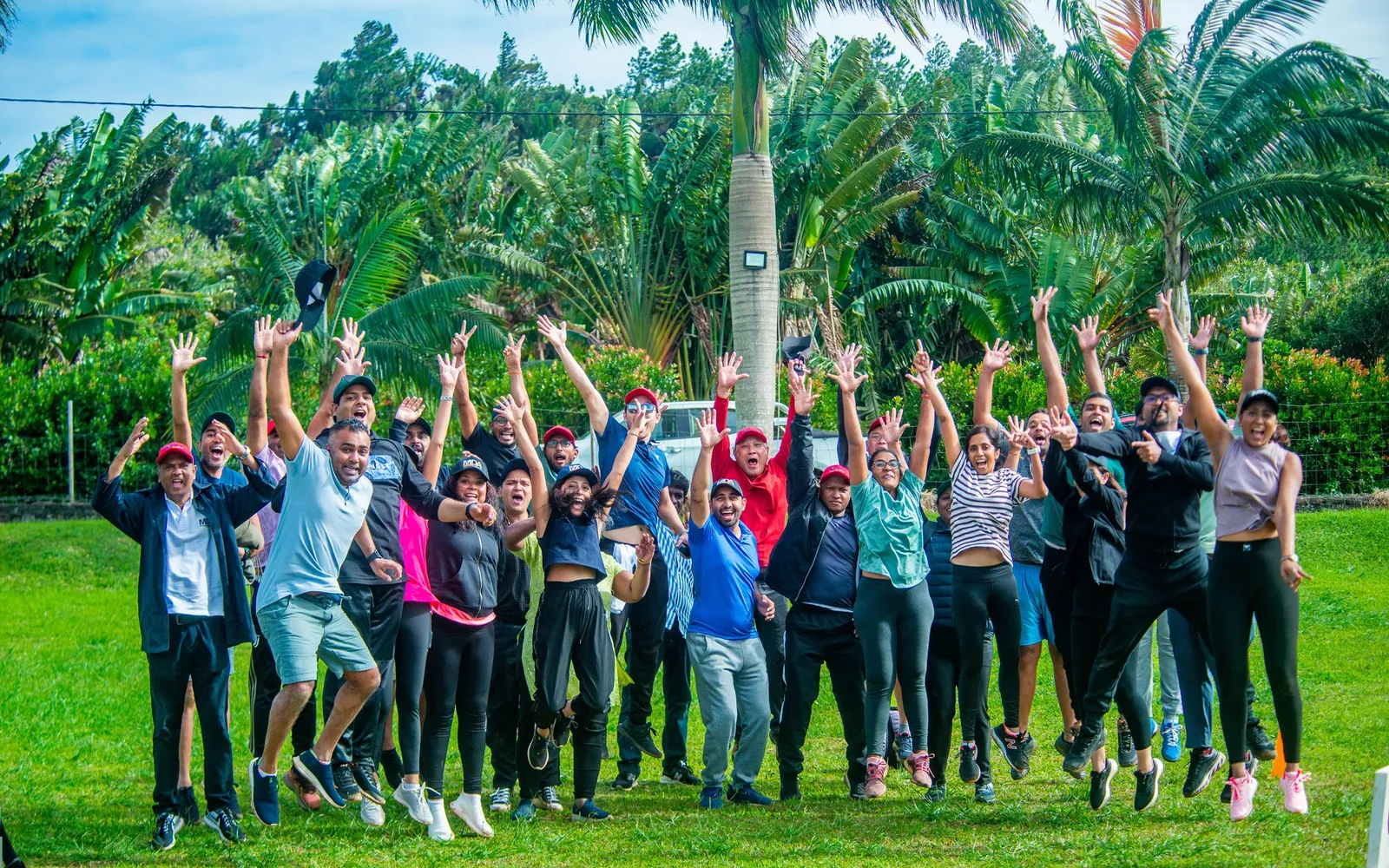 Students jumping in celebration during field day in Mauritius