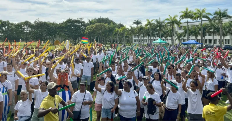 Large corporate event with team sticks