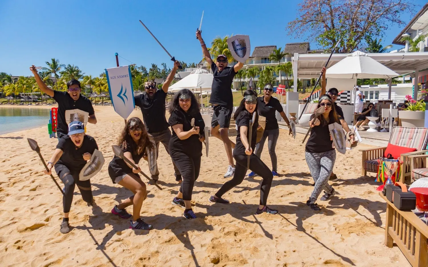 Team victory jump on beach during private event in Mauritius